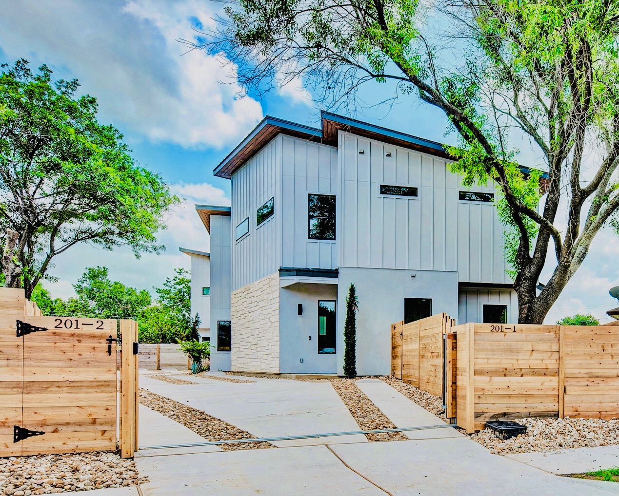 The 201 Tillery Square, Building 1 is ready for move in and is an exciting new modern home with 2 Bedrooms, 2.5 Bathrooms, and its own Carport.